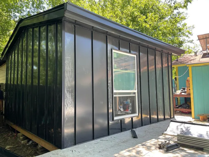 Black standing seam metal wall panels for Metal Roof Installation in River Road