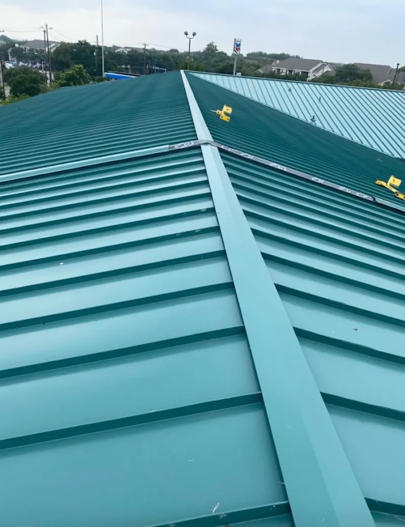 Green commercial metal roof ridge and valley for Metal Roof Repair in River Road